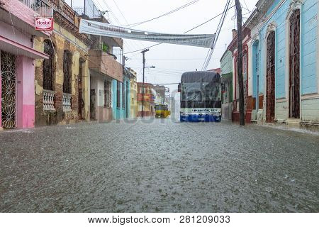 Santa Clara, Cuba June 3, 2018: Street Flooded With Rainwater