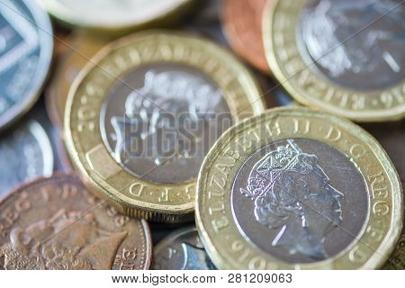 Close Up Of Fractional Currency Coins Of Pound Sterling Such As Ten Pence And One Pound . Saving And