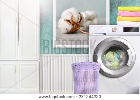 Laundry Room Interior With Washing Machine, Basket, Cotton Towels, Ambry And Cotton Flower Photo In 