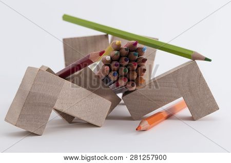 Wooden Colored Pencils On A White Background