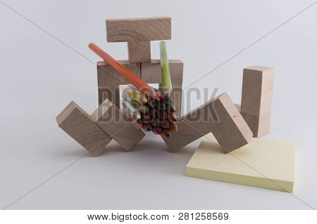 Wooden Colored Pencils On A White Background