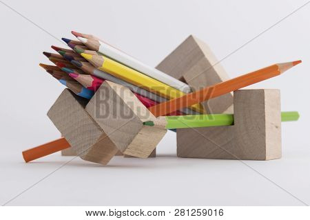 Wooden Colored Pencils On A White Background