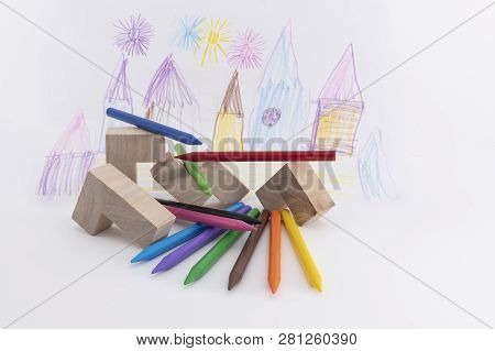 Wooden Colored Pencils On A White Background