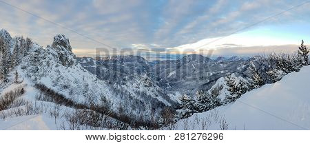Spectacular Winter Mountain Landscape Illuminated By Setting Sun.