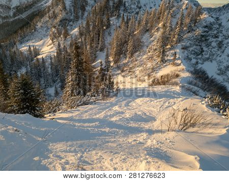 Spectacular Winter Mountain Landscape Illuminated By Setting Sun.
