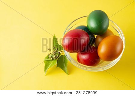 Colorful Easter Eggs, Easâster Or Spring Yellow Background With Home Painted Eggs. Top View, Copy Sp