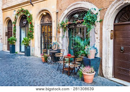 Rome, Italy - November 18, 2018: Arch Door Entrance Of Coffee Bar Called Caffe Novecento Decorated W