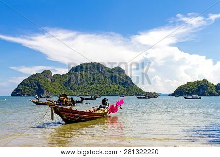 Beach And Small Boat With Sunshine At Baan Koh Teap Beach At Chumphon Province Thailand Is Famous Fo