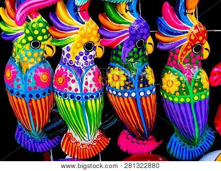Colorful Blue Pink Yellow Ceramic Parrots Oaxaca Mexico.  Many Ceramic Factories Throughout The Coun