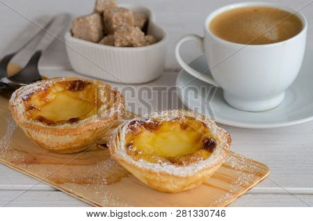 Pasteis de Belem,  portuguese egg tart pastries coffee at Lisbon cafe,Portugal. This weets making to