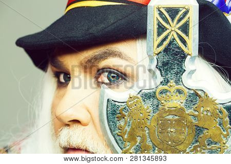 Senior Man Bearded Beefeater Yeomen Warder Or Male Royal Guard Bodyguard In Hat With Spear On Grey W