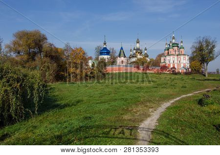 Old Sviato-troitskyi Monastery On A Background Of Autumn Trees In Gustynya. Chernihiv Region. Ukrain