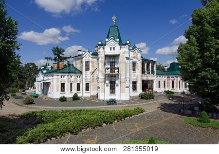 Beautiful Palace In The Park Against The Blue Sky. Hoetsky Manor, Tomashevka, Kiev Region, Ukraine. 
