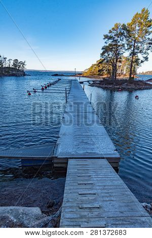Jetty Full Of Ice In A Lake