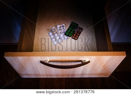 Pills Packs In The Drawer Of The Furniture