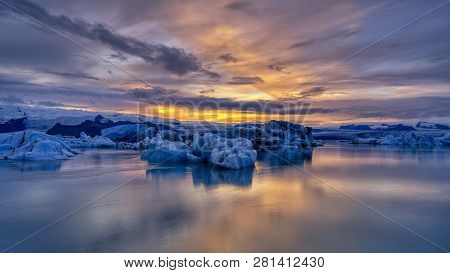 Sunset At Jokusarlon Glacial Lagoon In Southeast Iceland.