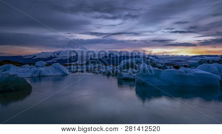 Sunset At Jokusarlon Glacial Lagoon In Southeast Iceland.