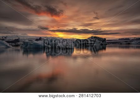 Sunset At Jokusarlon Glacial Lagoon In Southeast Iceland.