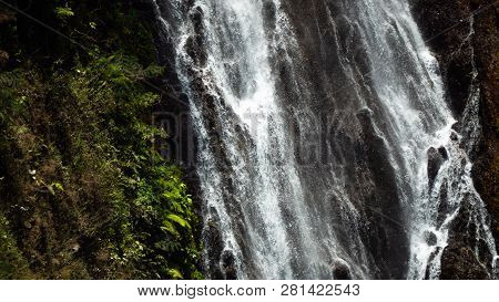 Waterfall Coban Sewu In Java, Indonesia. Waterfall In Tropical Forest By Drone Tumpak Sewu