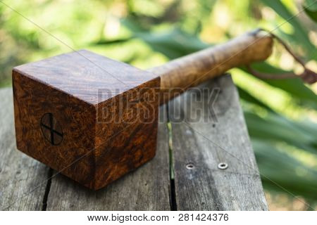 Mallet Hammer Made Of Burl Wood Tools For Used By Carpenter In Workshop On Isolated Blurred Backgrou