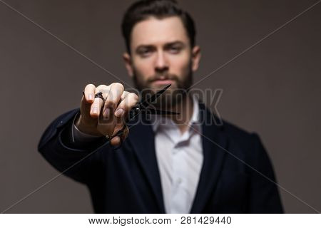 Young Handsome Bearded Hipster Man With Long Beard And Brunette Hair Holding Hairdresser Or Barber S