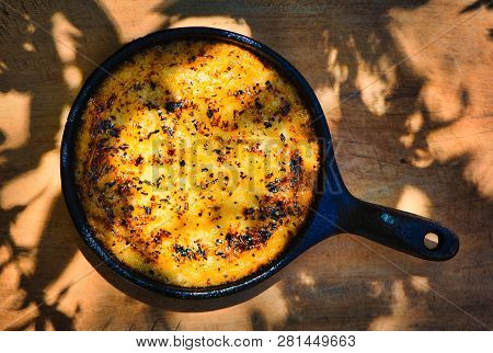 Delicious Argentinian Provolone Yarn Cheese (provoleta) That Was Cooked In A Cast Iron Skillet Over 