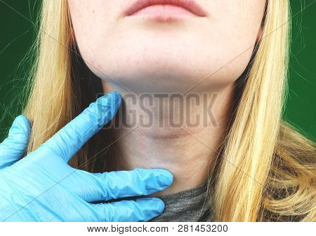 The Girl On Examination At The Doctor. Thyroid