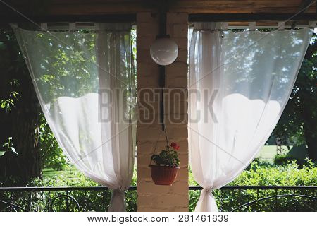 Summer Restaurant Terrace Or Veranda Interior With Open Space. Grass Decor And Garden View.