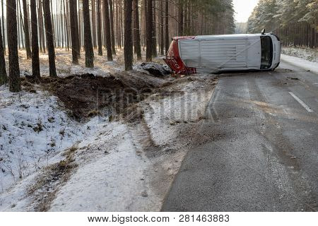 Podlesie, Pomorskie / Poland - January, 30, 2019: A Road Accident Of A Delivery Vehicle On An Icy Ro