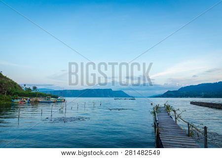 Lake Toba At Sunset - Landscape In Tuktuk, North Sumattra, Indonesia. Lake Toba Is A Popular Tourist