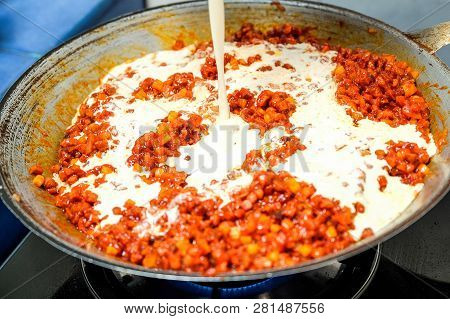 Cooking Pork With Bbq Sauce And Diced Waternuts