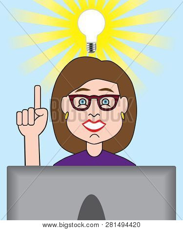 A Woman Working On Her Computer Has Just Had A Great Idea