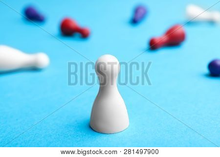 White Pawn Standing Alone And Other Fallen Down On Table. Victory Concept