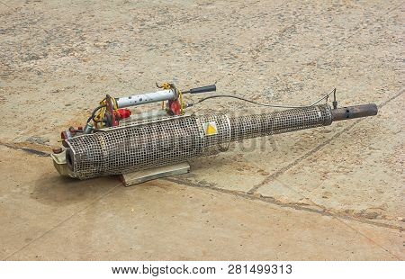 Fogging Machine On Ground To Fog With Insecticides For Kill Aedes Mosquito, Carrier Of Dengue Virus 