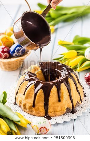 Delicious Holiday Slovak And Czech Cake Babovka With Chocolate Glaze. Pouring Chocolate Topping. Eas