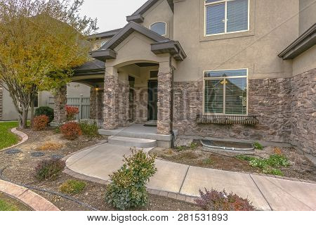 Facade Of Home With Front Yard In Eagle Mountain