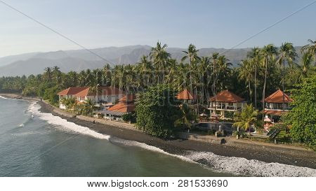 Aerial Seascape Luxury Hotel On Beach Background Mountainss In Tropical Resort. Bali, Indonesia, Tra