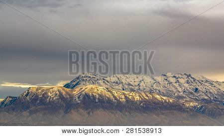 Snow Capped Mount Timpanogos Lit By Sunlight