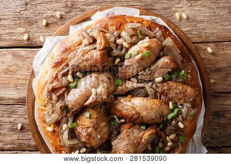 Chicken With Sumac And Onions With Flat Bread Taboo Close-up On A Plate. Horizontal Top View