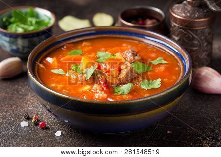 Thick Tomato Soup With Meat, Cereals And Vegetables. Traditional Oriental Cuisine, Spicy Stew With B