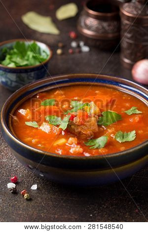 Thick Tomato Soup With Meat, Cereals And Vegetables. Traditional Oriental Cuisine, Spicy Stew With B