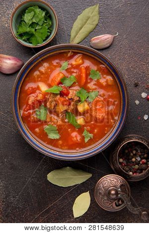 Thick Tomato Soup With Meat, Cereals And Vegetables. Traditional Oriental Cuisine, Spicy Stew With B