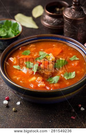 Thick Tomato Soup With Meat, Cereals And Vegetables. Traditional Oriental Cuisine, Spicy Stew With B