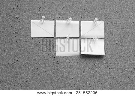 Horizontal Cork Board With Many, Sticky Notes Pinned