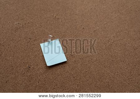 Horizontal Cork Board With Many, Sticky Notes Pinned