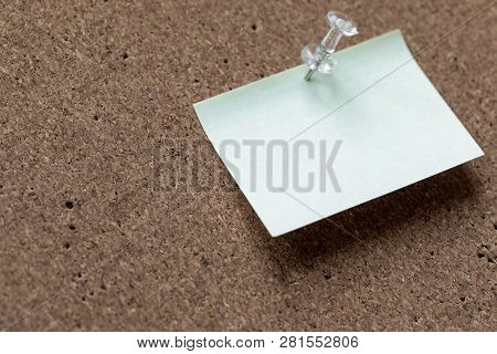 Horizontal Cork Board With Many, Sticky Notes Pinned