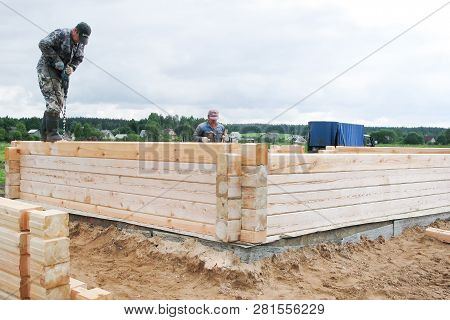 Minsk Region. Belarus. February 24, 2016. Workers Drill Holes For Driving Nagel. Construction Of Bon