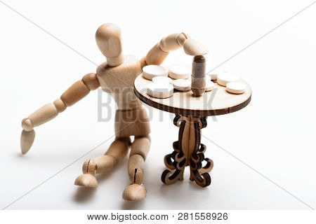Medication Regimen. Human Wooden Dummy Near Table With Medicines. Tips Tackling Complex Medication R