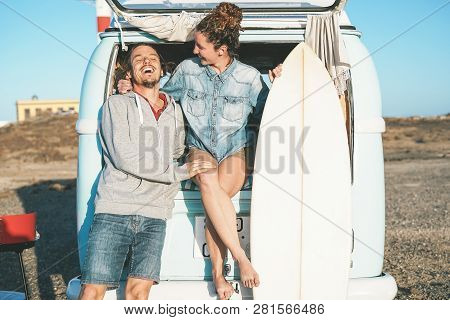 Happy Surfers Couple Standing Behind On Vintage Camper Mini Van - Young People Adventuring On Road T