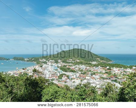 Bombinhas - Sc, Brazil. Panoramic View Of The Touristic City Of Bombinhas And Some Beaches With Blue